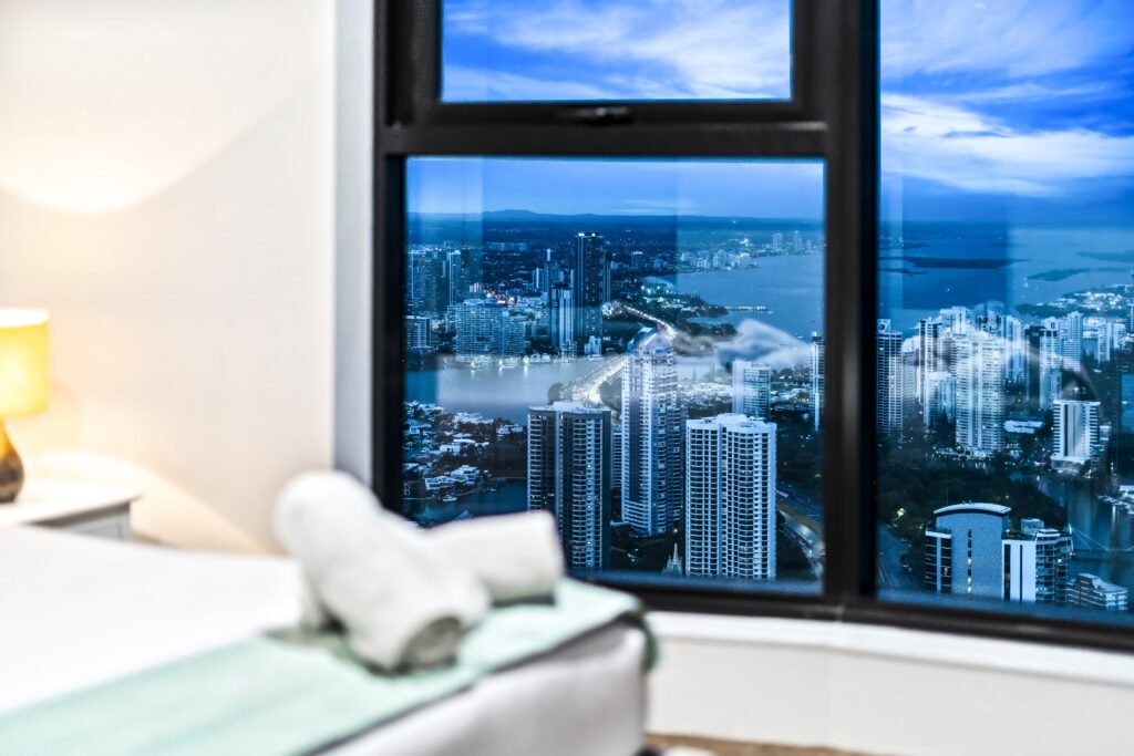 Bed corner with window view of Gold Coast skyline